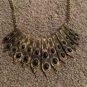 Gold and black necklace